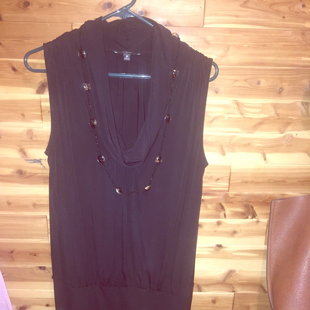 Black fitted cocktail dress with necklace