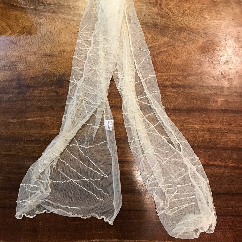 Embroidered cream scarf