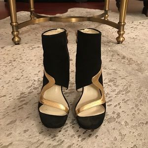 Black and gold heels