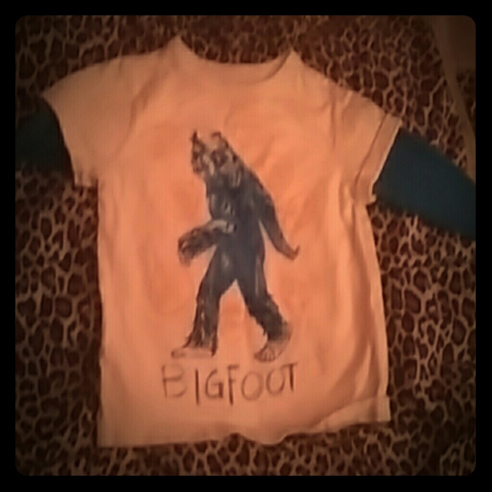 A Baby shirt, jeans,and hat