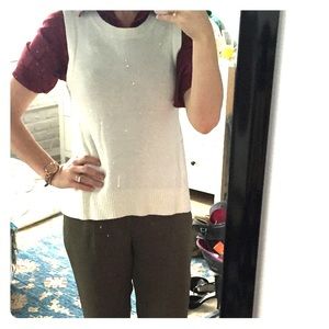 Vest with leather like details