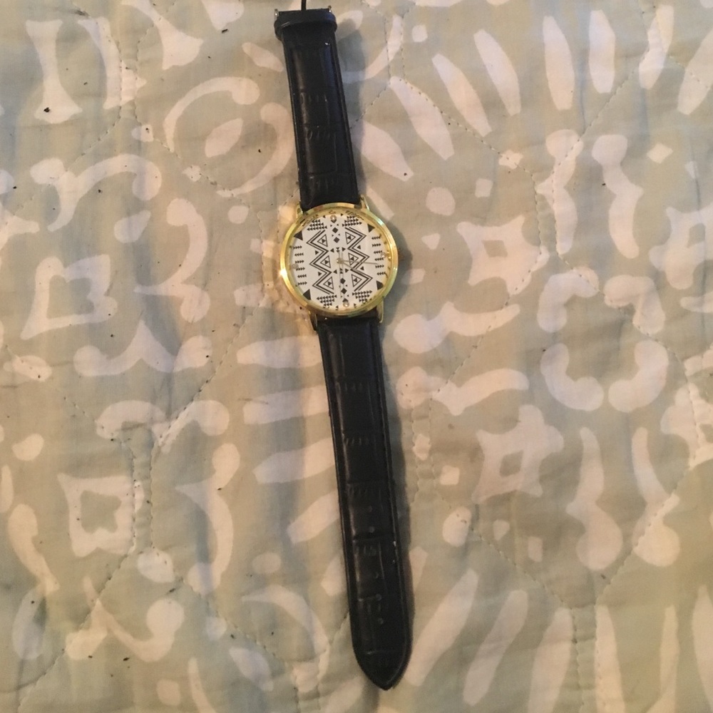 Tribal faced watch