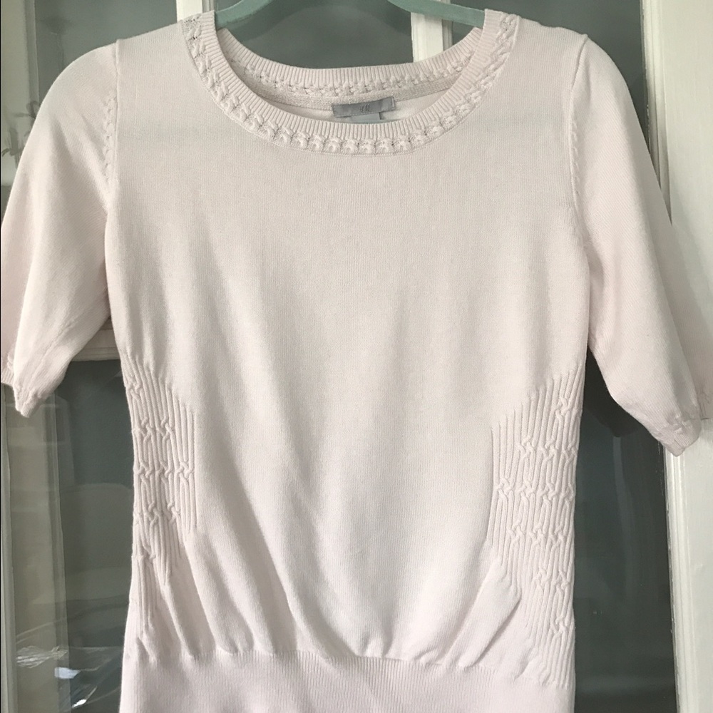 Attractive cream sweater top with ruching on sides