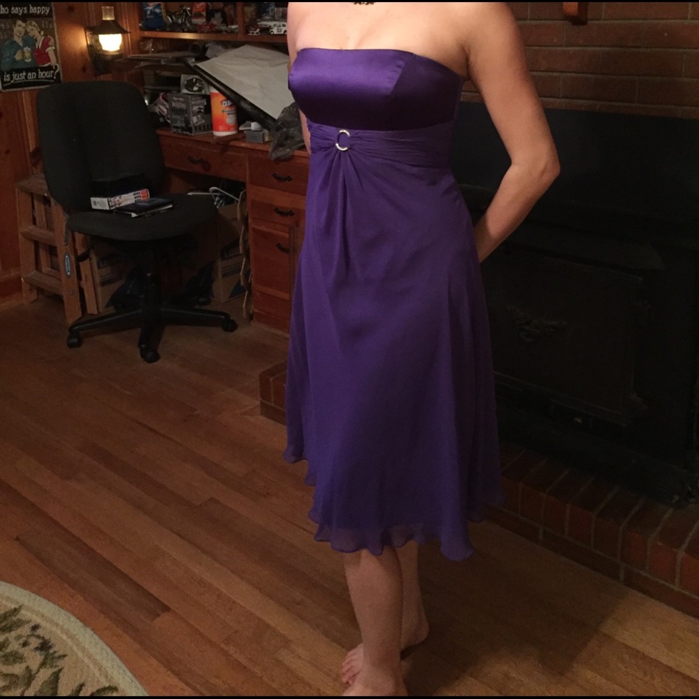 Purple strapless tea length dress