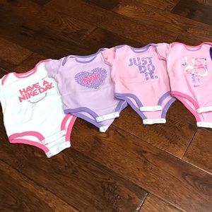 Bundle of 4 NIKE Onesies