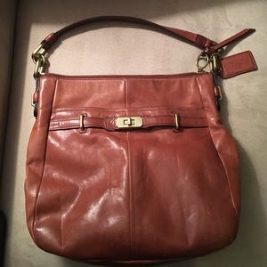 Medium coach shoulder satchel camel color