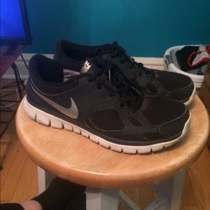 Fairly used black Nike athletic shoes