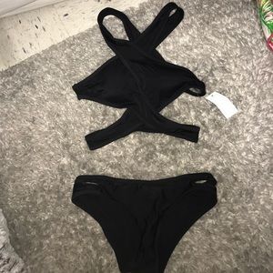black cross body bathing suit