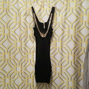 Black dress with sequined neck