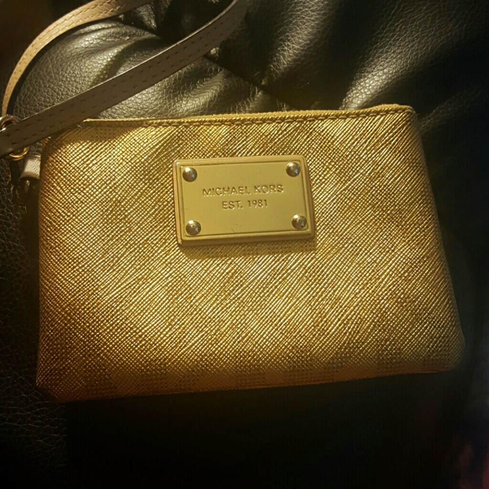 Gold Michael kors wristlet