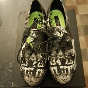 Iron fist loose tooth studded flatforms