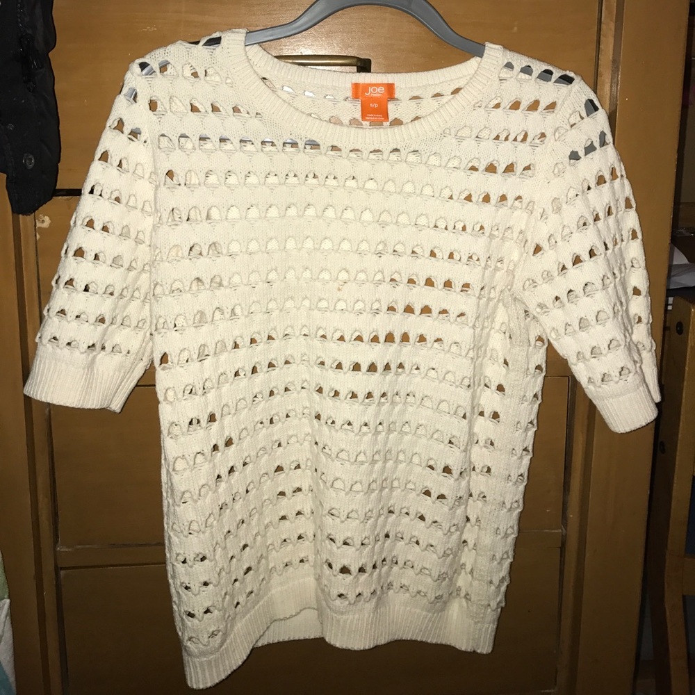 Cream sweater with crochet hole detailing