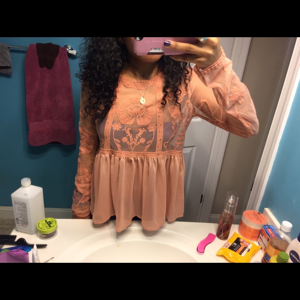 A peach long sleeve lace shirt!