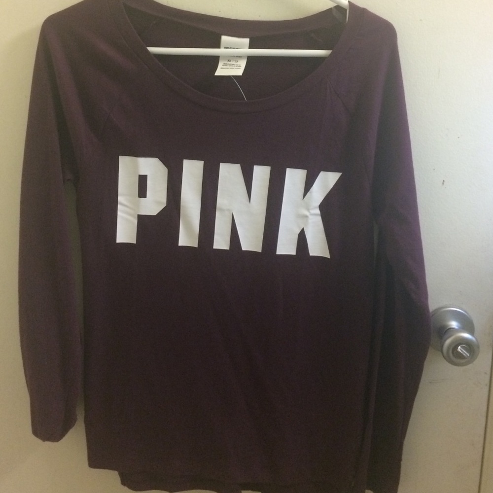 A long sleeve Burgundy top