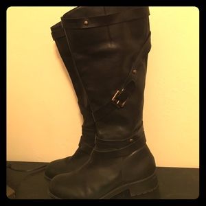 Anthropologie black leather strapped boots
