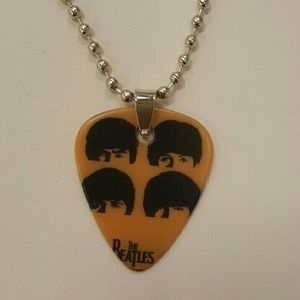 Beatles guitar pick.