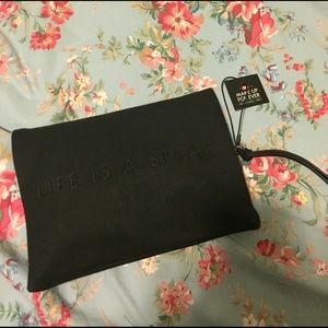Make Up Forever faux leather clutch