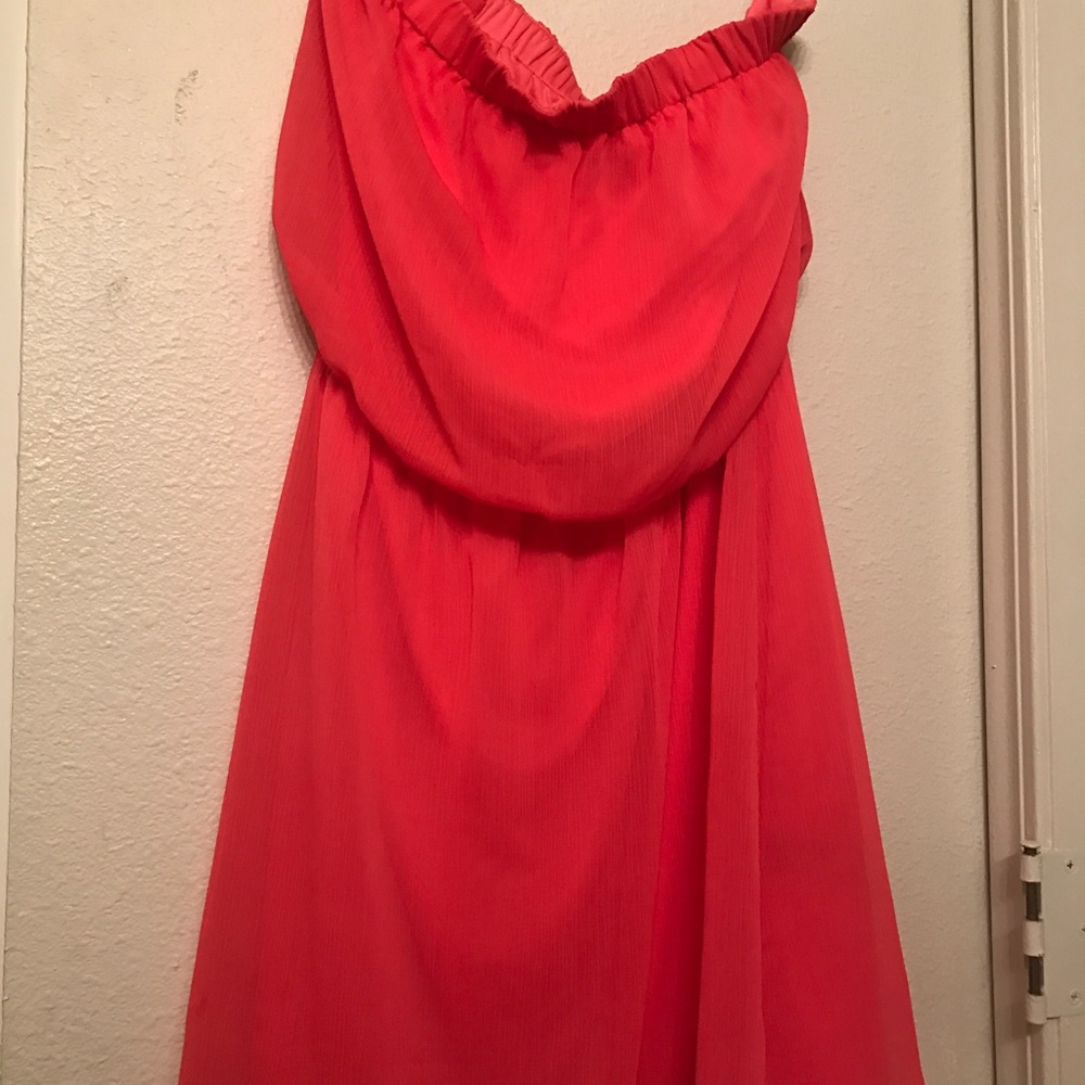 Pink strapless dress.