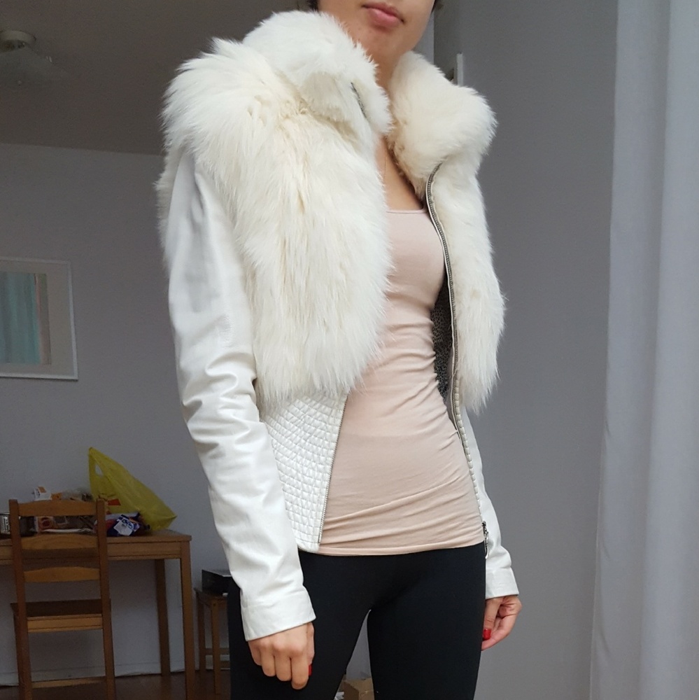 Designer Leather jacket with fur. XS