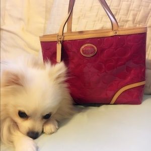 Pink/magenta patent leather Coach purse