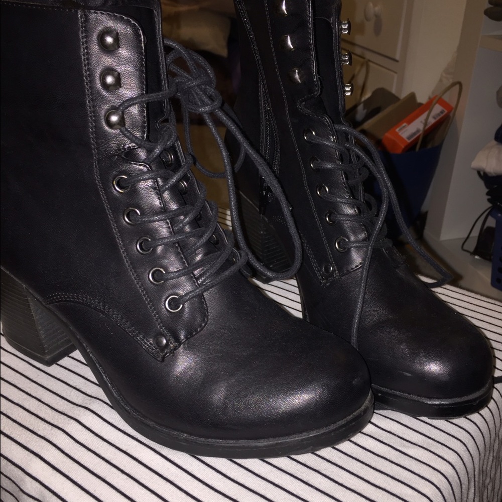 Black combat high heeled boots