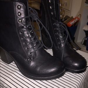 Black combat high heeled boots