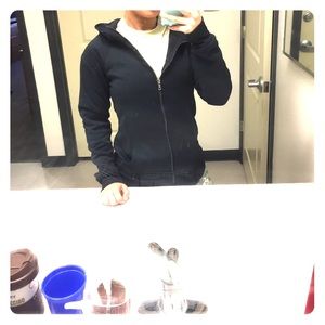 Black semi fitted under armour jacket.