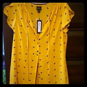 Yellow short sleeve button down shirt