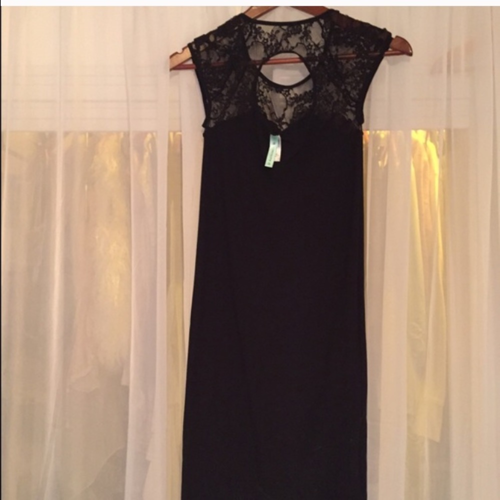 Form fitting black lace dress
