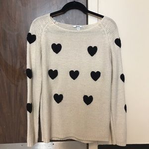 Cream sweater with black hearts
