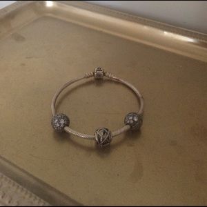 Pandora bracelet with galaxy charm and stoppers