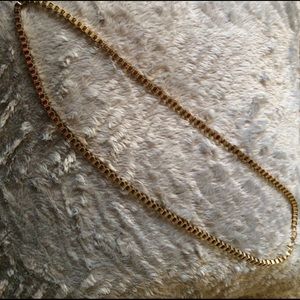 Bicycle gold chest length chain