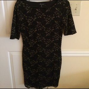 Bodycon black and gold accent dress