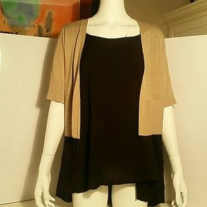 Gold cardigan.    (BT1)