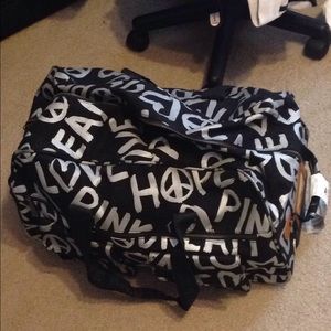 Victoria's Secret rolling suitcase