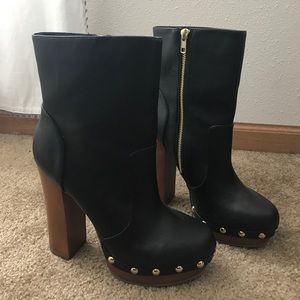 Black leather mid calf boots with gold studs