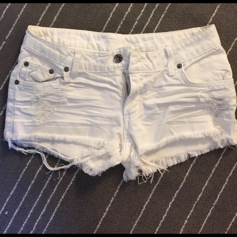 White distressed denim shorts