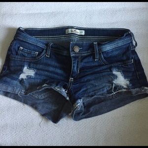 Ripped blue jean shorts