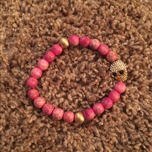 Handmade pink and gold skull bracelet