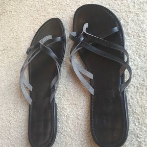 Black strappy flip flops