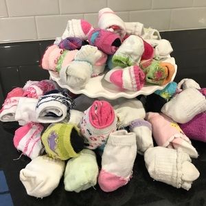 A LOT OF BABY GIRL SOCKS