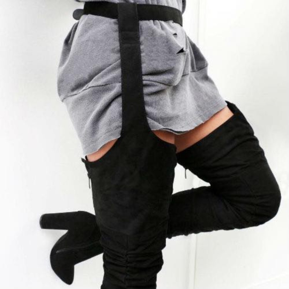 Exclusive  thigh high boots.