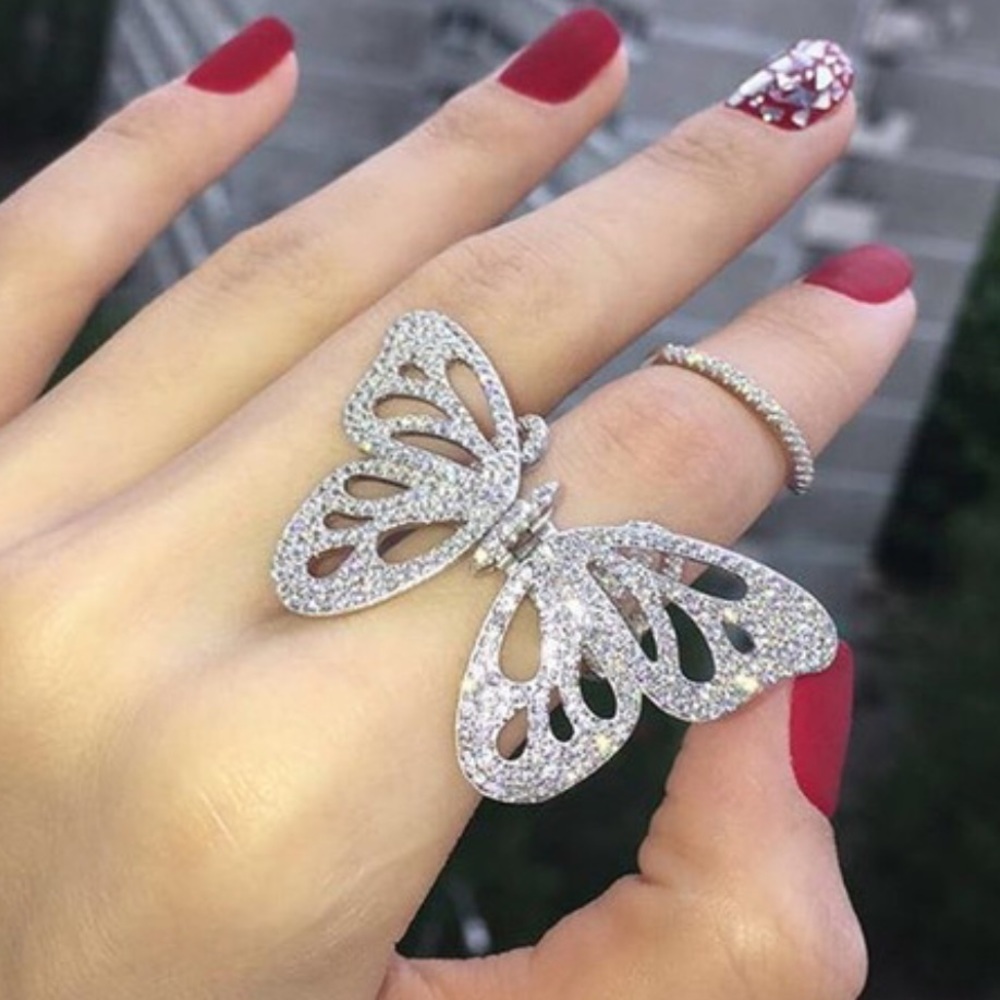 Hold 925 Sterling Silver finger moving Butterfly