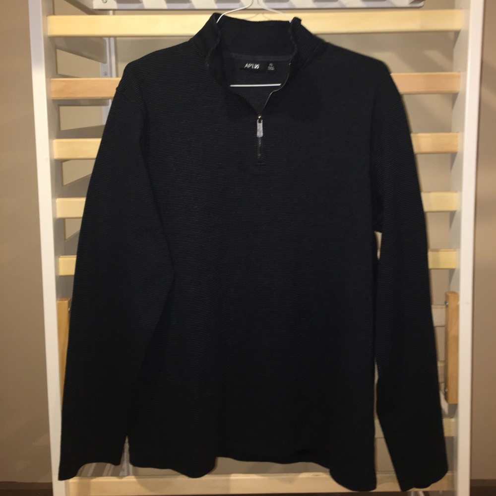 Black long sleeve quarter zip shirt.