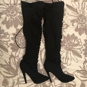 Over the knee lace up boots