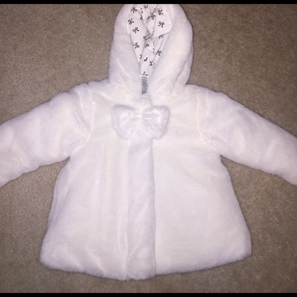 pure white coat. never worn. 18months