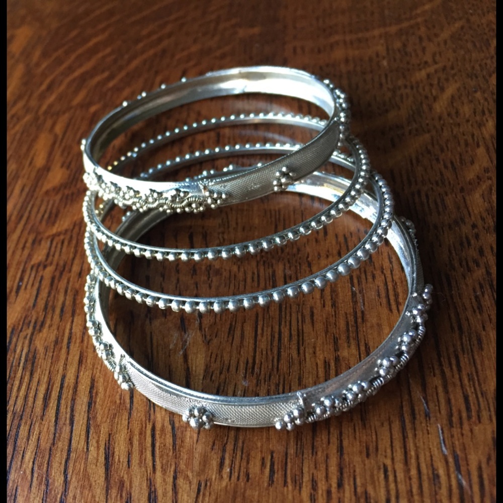 Silver bangle bracelets. Set of 4.