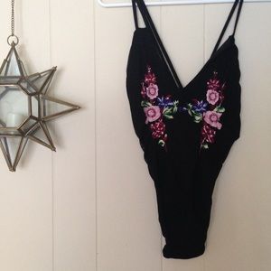black, flower patterned bodysuit