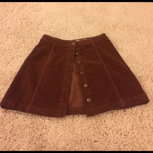 Brown corduroy button down skirt.