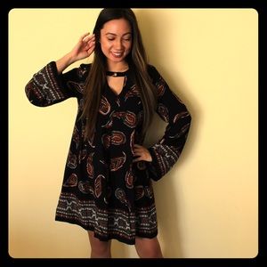 70s inspired flared sleeve dress with mock choker